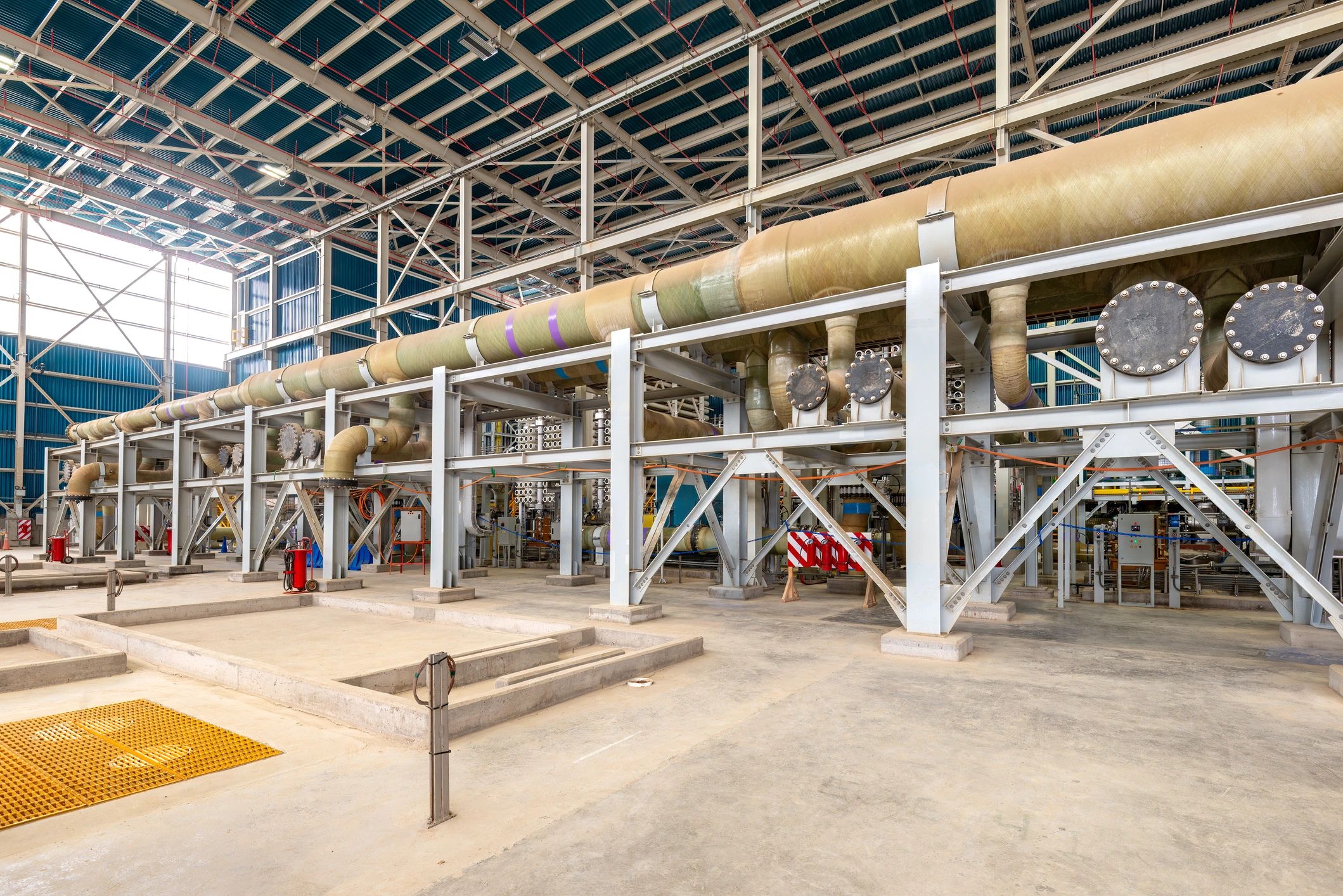 Industrial facility piping and equipment representing ultrasonic testing inspection work